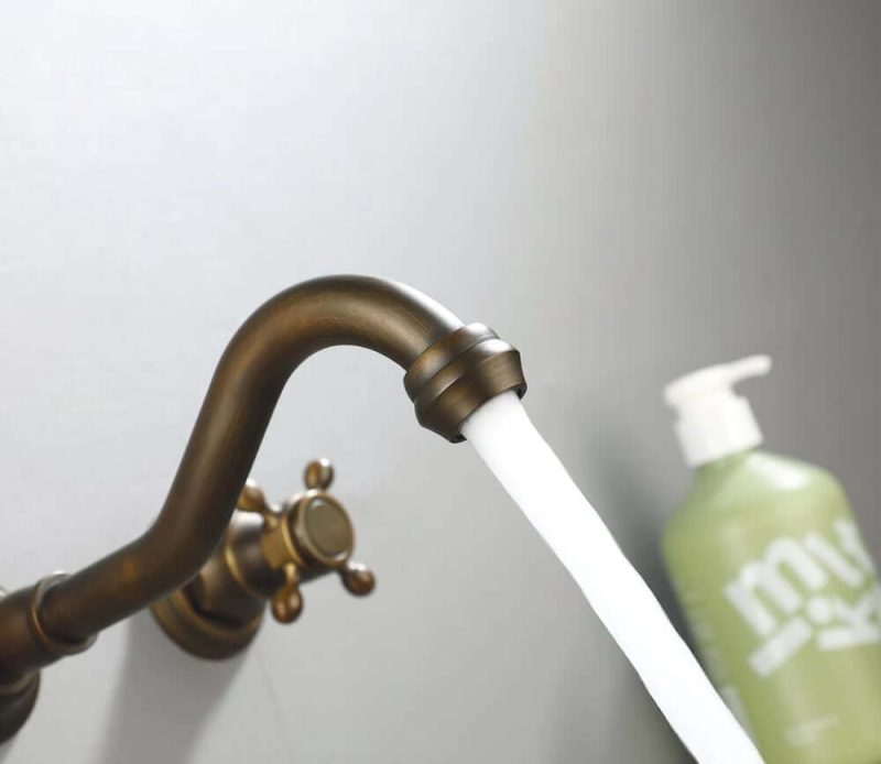 Chester Wall Mount 2-Handle Antique Brass Bathroom Sink Faucet with Cross Handles