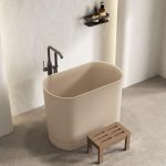 Green Elliptical Freestanding Bathtub with Seat, Back to Wall Design, Soaking Bath Therapy, and Simplistic Style