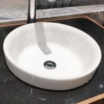Modern White Ceramic Orbicular Drop-in Bathroom Sink with Center Trapway